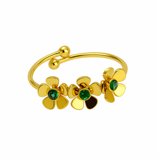 The Vellura Jewellery Gold Floral Adjustable Ring with Green Gemstone features three flower-shaped designs with green gemstone centers on a white background, adding elegance to any floral ring collection.