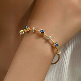 Gold cable bracelet with evil eye and cubic zirconia charms-Vellura Jewellery