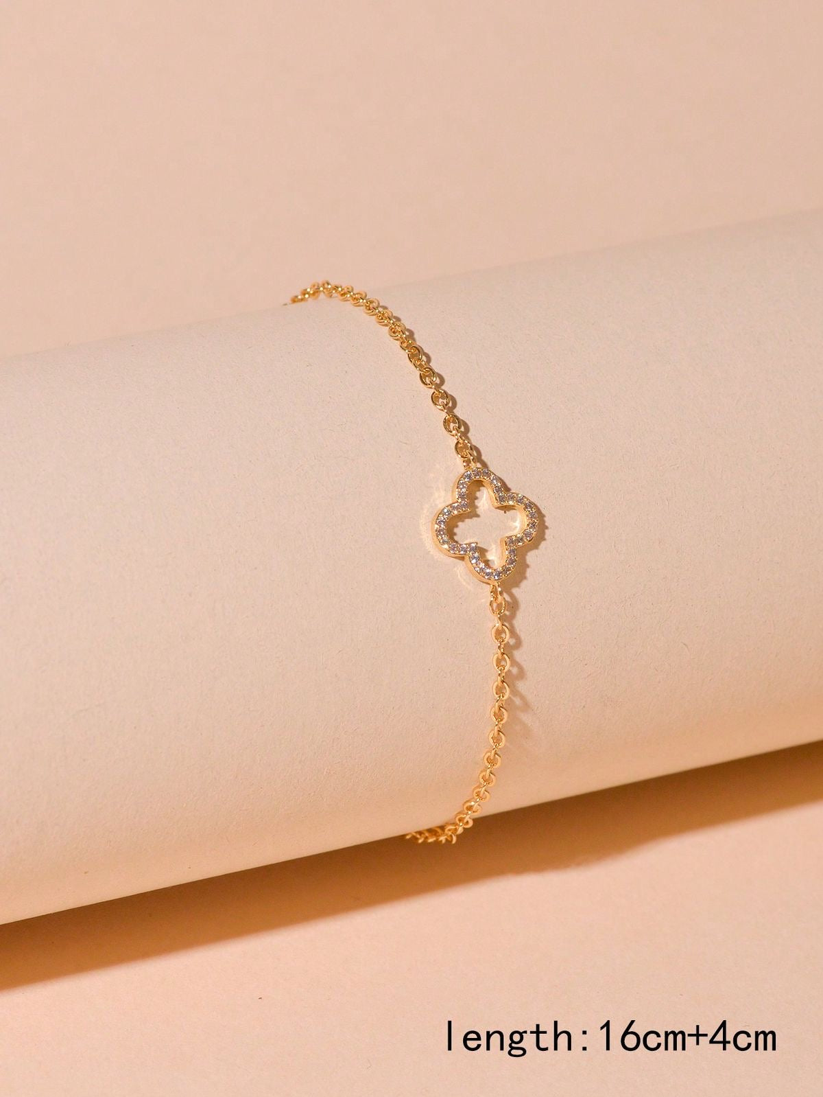 Elegant Gold Clover Bracelet with Sparkling Crystals – Adjustable