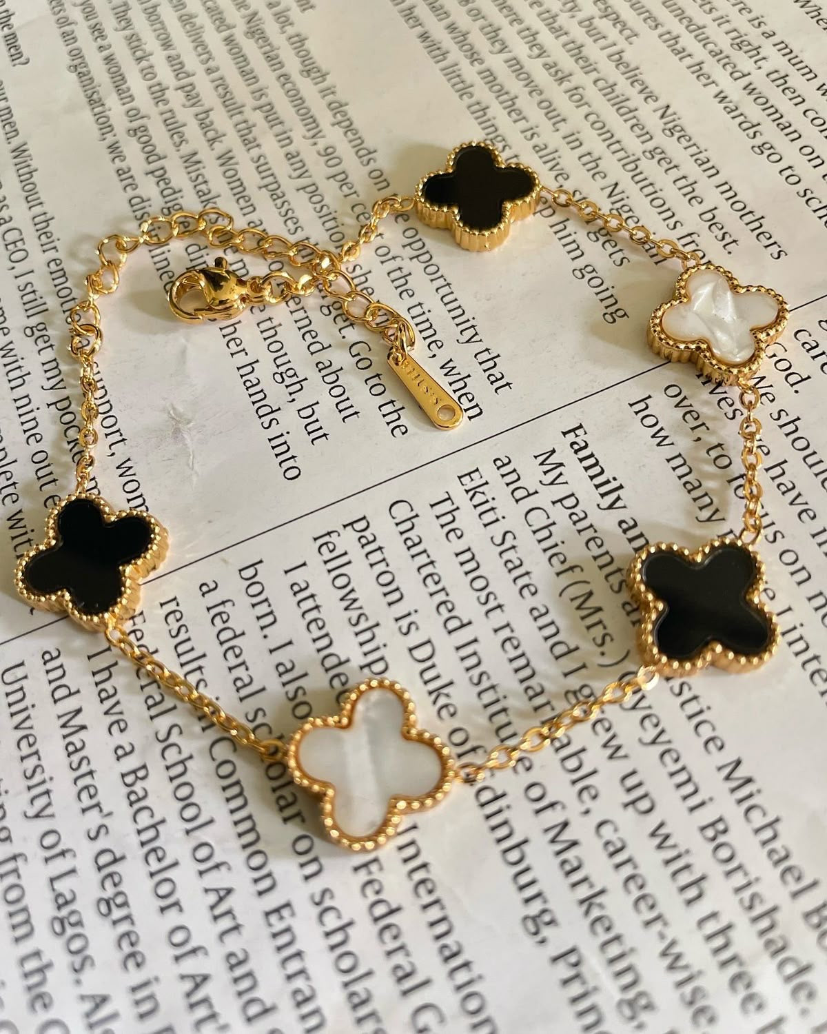 Elegant Black & White Clover Bracelet