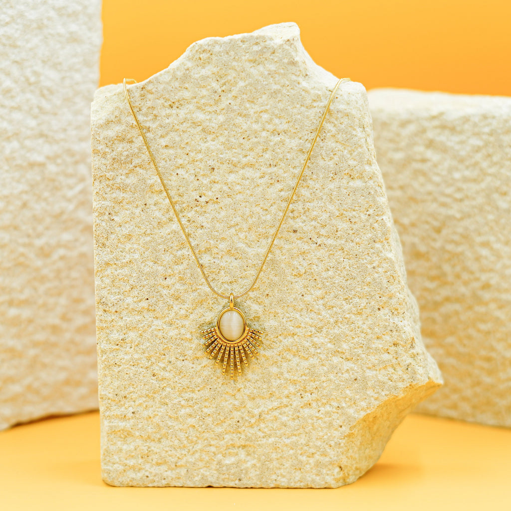 Elegant Gold Sunburst Pendant Necklace with Oval Stone Vellura Jewellery