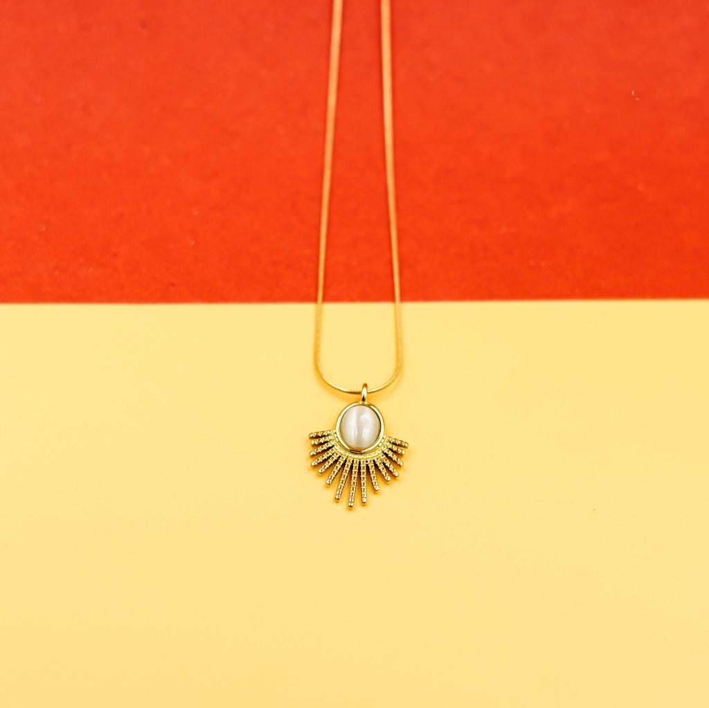 Elegant Gold Sunburst Pendant Necklace with Oval Stone Vellura Jewellery
